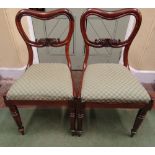 A harlequin set of six late regency period rosewood dining chairs with upholstered seats on turned