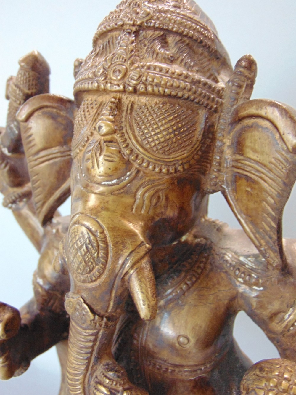 Indian gilt cast bronze figure of Ganesh the elephant god, upon a stepped circular plateau and - Image 3 of 3