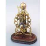 Good antique single fusee pierced brass skeleton clock, the stylised chapter ring with pierced