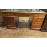 A 19th century mahogany partners writing desk, fitted with the usual arrangement of drawers and