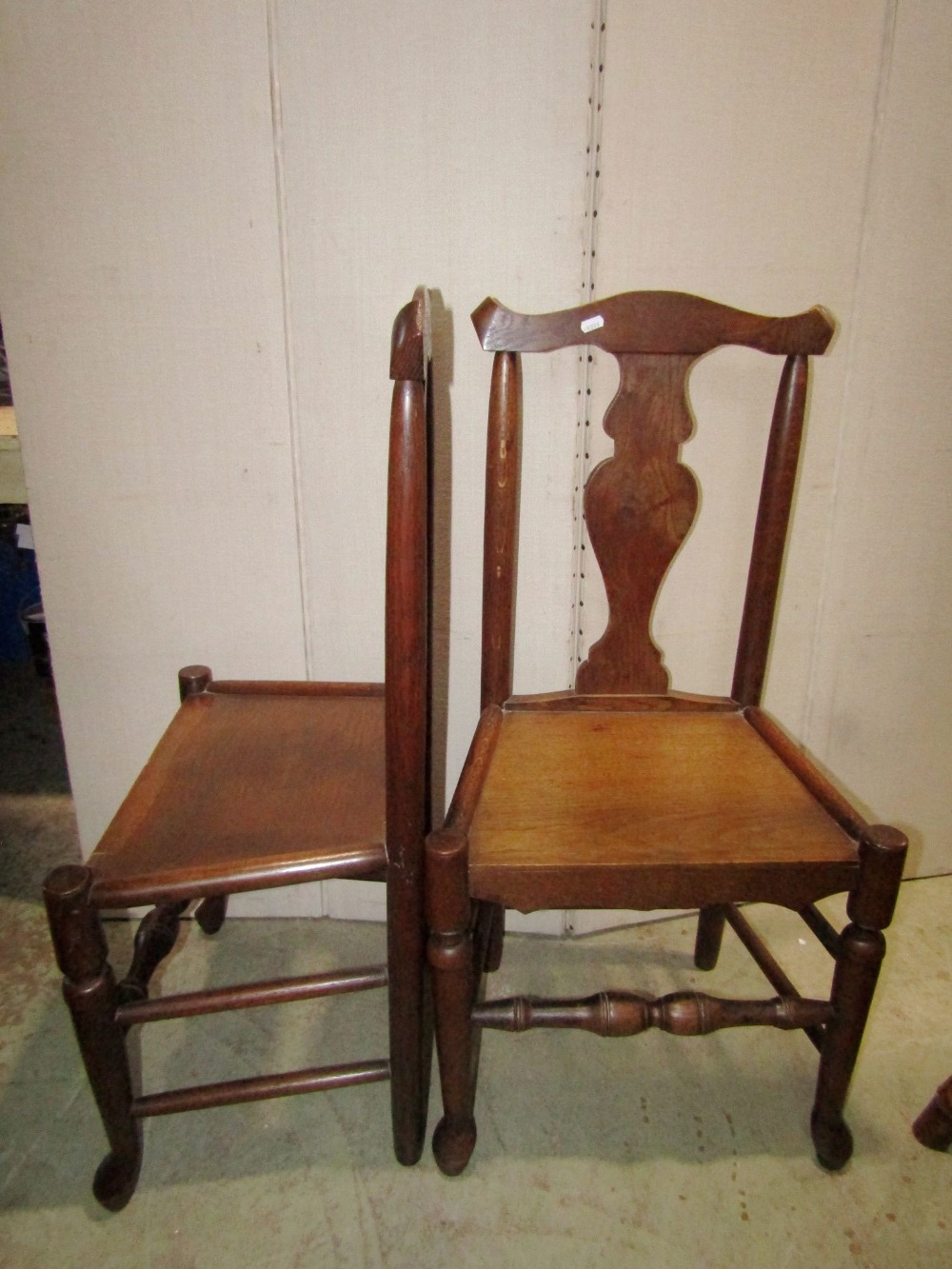 A pair of Georgian oak dining chairs with yoke shaped rails, vase shaped splats, solid seats - Image 2 of 2