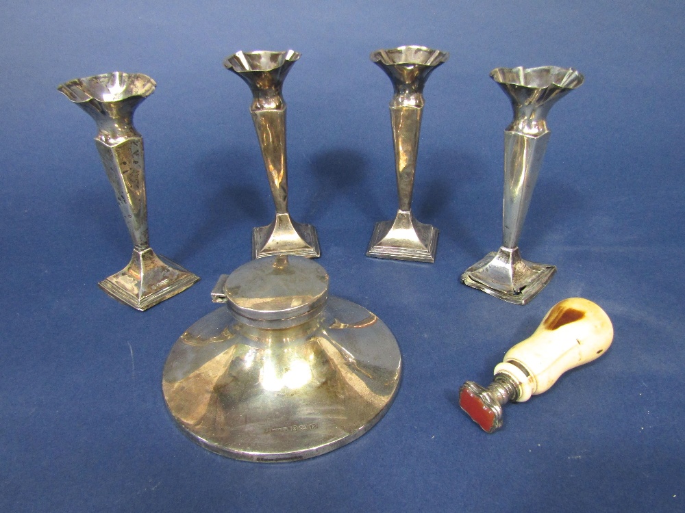 Set of four early 20th century silver trumpet vases, together with a further silver capstan