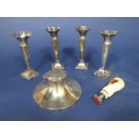 Set of four early 20th century silver trumpet vases, together with a further silver capstan