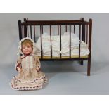 Antique German bisque headed doll with closing eyes, open mouth, teeth and moving tongue with