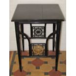In the manner of E W Godwin - An unusual aesthetic movement period ebonised occasional table of