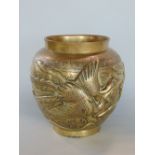 Early 20th century Japanese cast bronze pot, embossed with twin phoenix and a flowering lotus,