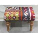 A good quality contemporary Victorian style stool, with Kelim covered rectangular seat raised on
