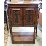 An Actuelle Gramophone cabinet in the form of an Old English style breakfront side cupboard, with
