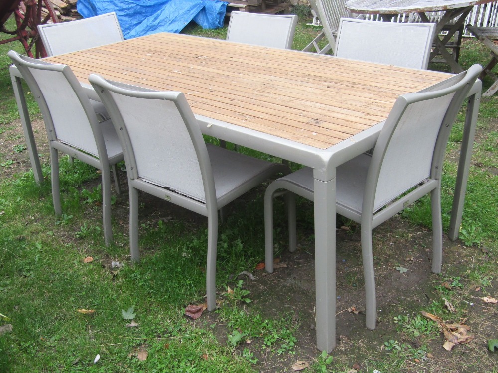 A contemporary Gloster coated light steel or aluminium framed garden terrace table of rectangular