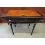 A good quality 19th century ebonised foldover top card table of rectangular form, with well