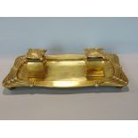 Good quality cast brass Art Nouveau standish fitted with two lidded inkwells upon a shaped