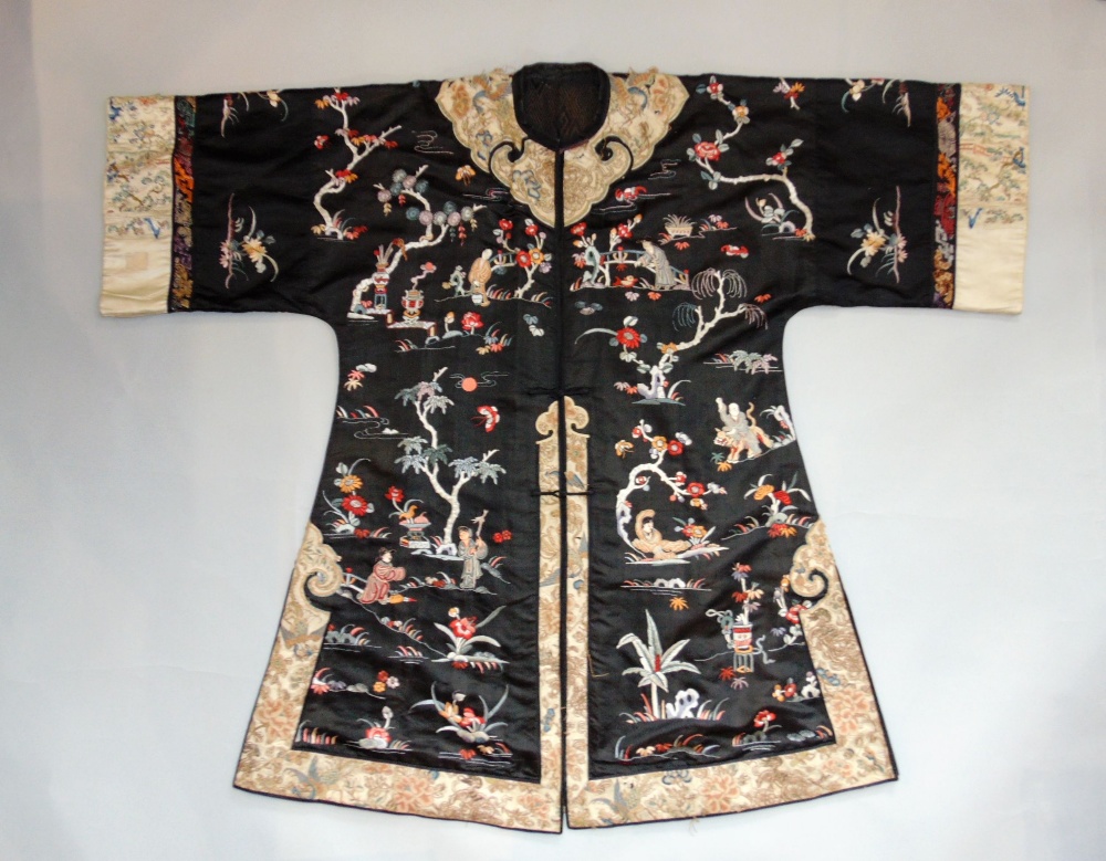 Late 19th/ early 20th century Chinese robe with black silk ground extensively embroidered with