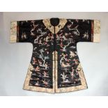 Late 19th/ early 20th century Chinese robe with black silk ground extensively embroidered with