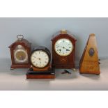 Art nouveau walnut two train drum head mantel clock, with box wood inlay, the enamelled dial with