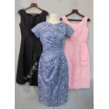 Three 1960's ladies dresses including a blue and white patterned dress with sculptured bodice