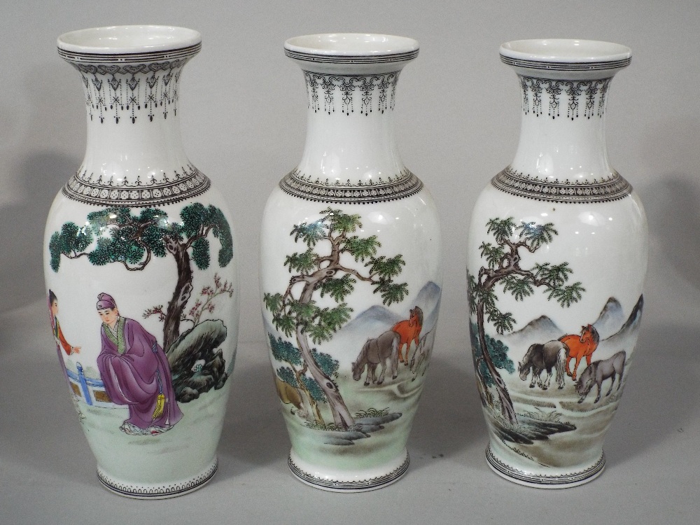 A collection of modern oriental vases with various character and landscape decoration on a white - Image 2 of 5