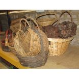 A quantity of contemporary wicker baskets of varying size and design, to include a heart shaped