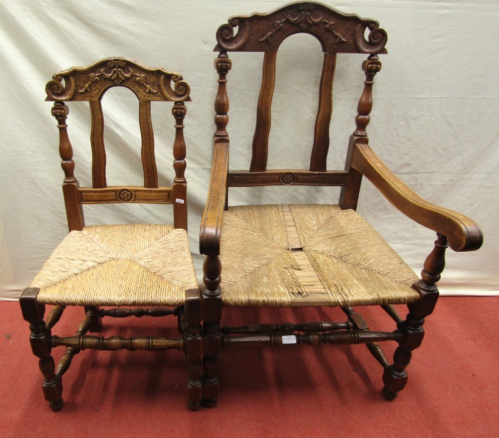A set of eight (6+2) oak dining chairs with turned legs and spindles, carved cresting rails and rush