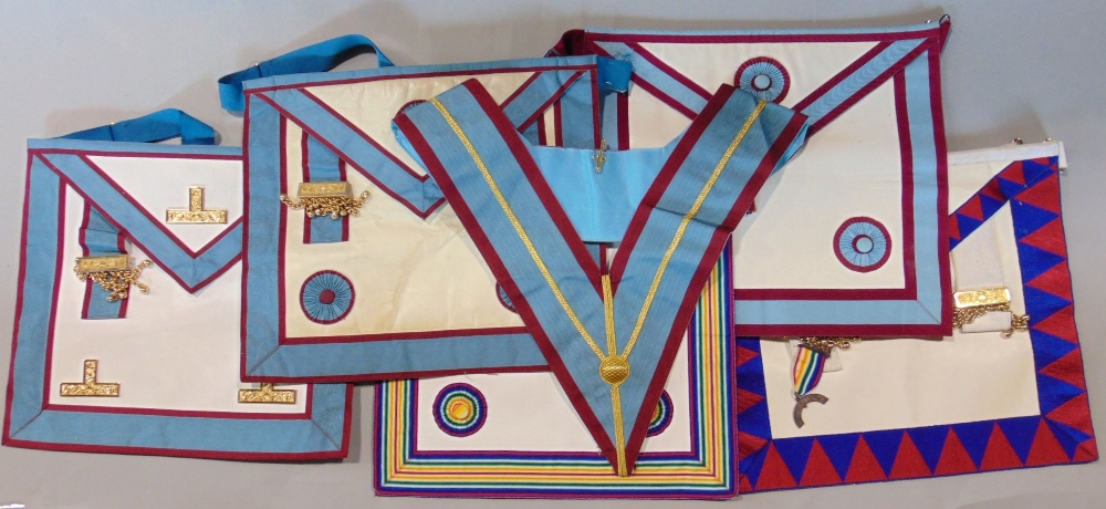 A collection of five envelope shaped Masonic aprons (5)