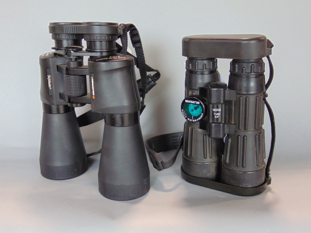Two pairs of binoculars to include Celestron Skymaster 9x63 and pair of Monk Optic Navigator 7x50,