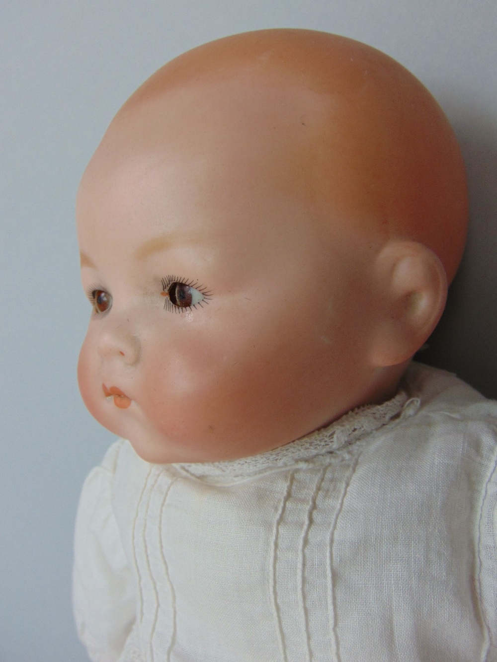 A collection of four various bisque headed dolls to include an Armand Marseille baby doll example - Image 3 of 4