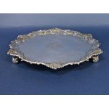 George II silver salver with pie crust border and scallop shell detail, centrally engraved with a