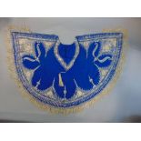 Vintage short cape in blue wool fabric elaborately decorated with gold coloured embroidery and
