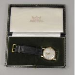 Unmarked yellow metal Smith Astral vintage gent's wrist watch, the champagne dial with Arabic and