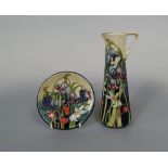 A Moorcroft ewer of slender tapering form with bluebell detail, 19cm tall approx, together with a
