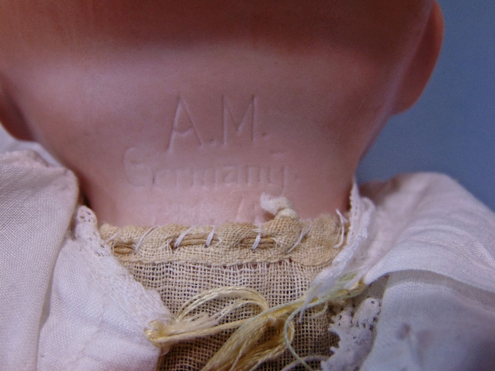 A collection of four various bisque headed dolls to include an Armand Marseille baby doll example - Image 4 of 4