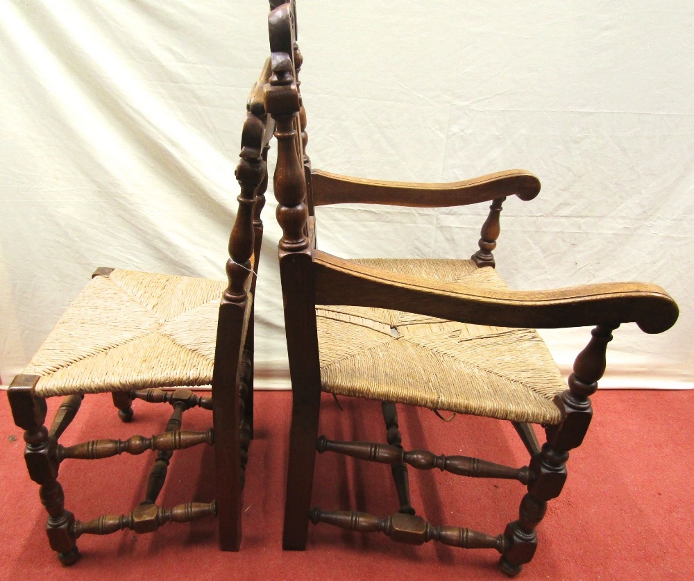 A set of eight (6+2) oak dining chairs with turned legs and spindles, carved cresting rails and rush - Image 2 of 2