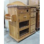A sturdy solid pine kitchen work station/unit, with rectangular inset marble top over an arrangement