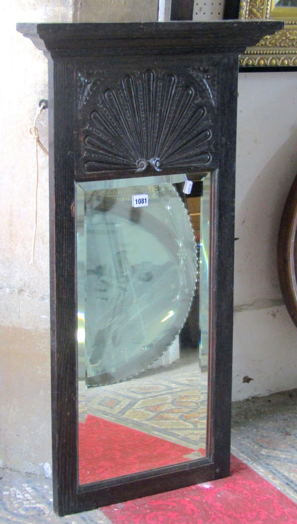 An Old English style oak framed pier glass, with rectangular bevelled edge plate and carved fluted