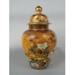 A substantial late 19th century Satsuma type vase and cover with polychrome painted floral and