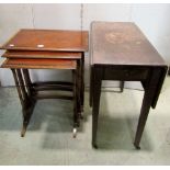 A nest of three reproduction Georgian style occasional tables, the rectangular tops with yew wood