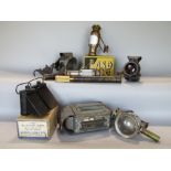 A box containing a collection of various car lamps and other lighting