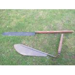A vintage hay knife, together with other with long ashwood handle (2)