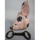 Vintage farmers bull nose ring puller, together with a butchers wall display of a Gloucestershire