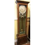 A longcase regulator, the oak case enclosing a 10 inch diameter silvered dial with cast and