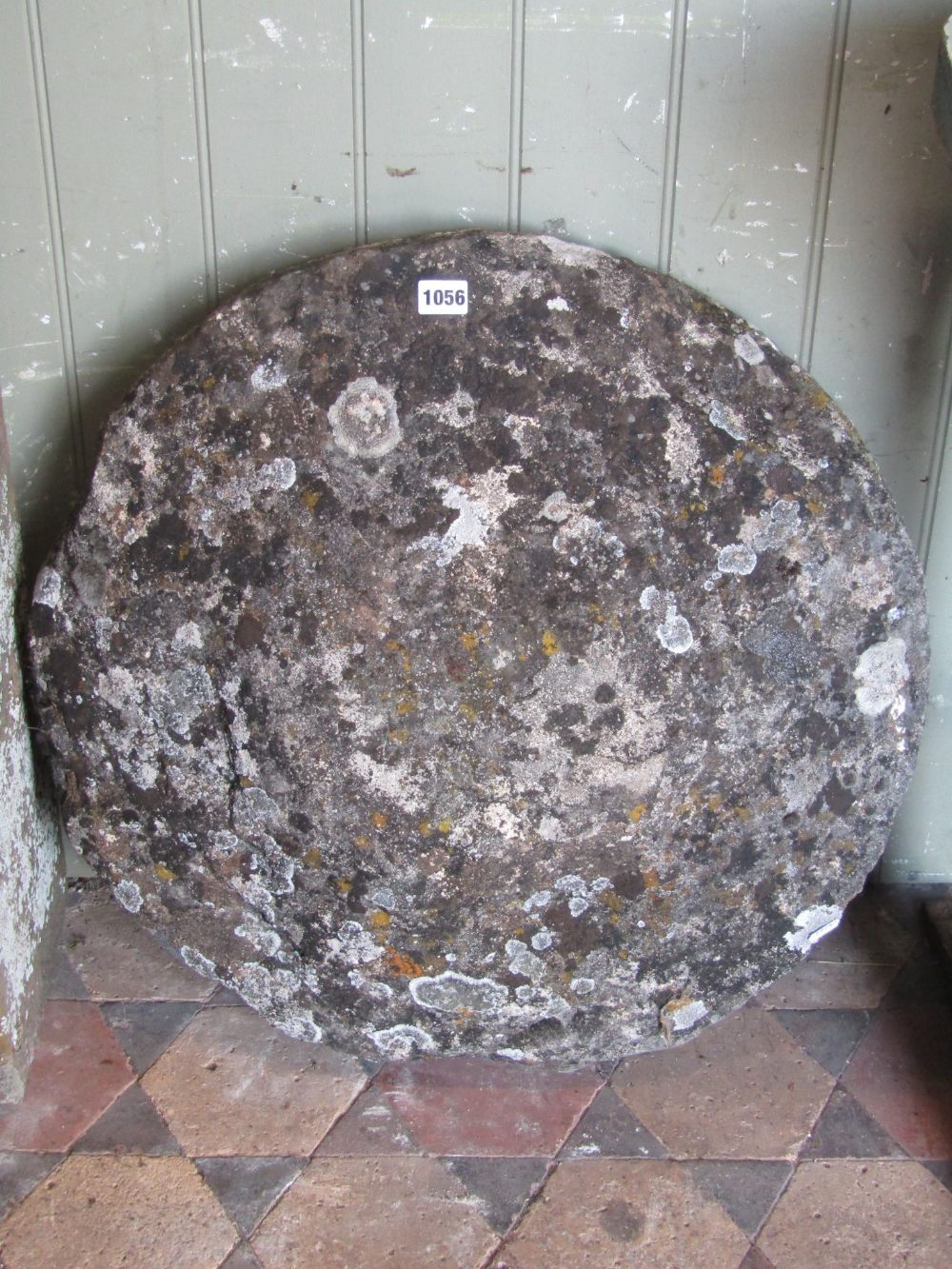 A weathered natural stone staddlestone cap, 60cm diameter approx