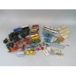 A box containing a collection of used die-cast Dinky toys together with a further collection of