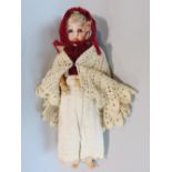 Antique German bisque headed doll with open eyes, open mouth with teeth, articulated wooden limbs