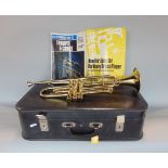 Cased Zenith mark III brass lacquered trumpet in case with mouthpiece and sheet music, the case 57