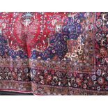 Good Persian Tabriz carpet, floral design, red ground, 400 x 300cm