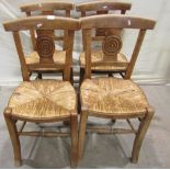 A set of four 19th century French dining chairs with stained beechwood frames, moulded domino