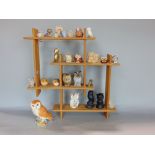 A collection of various owls to include a Beswick examples and others
