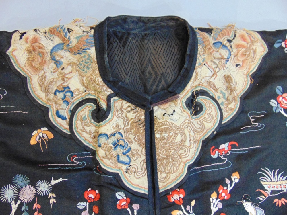 Late 19th/ early 20th century Chinese robe with black silk ground extensively embroidered with - Image 2 of 9