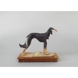 A limited edition Albany China Ltd model of a saluki by Neil Campbell, raised on a rectangular