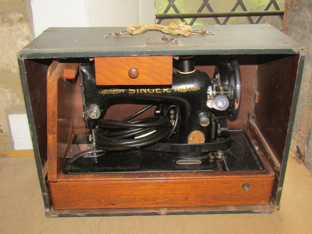 A vintage cased portable Singer sewing machine, together with an Ekco Bakelite cased mains radio - Image 3 of 3