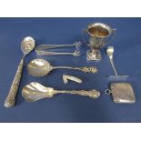 Mixed collection of bijouterie silver to include a vesta case, sugar tongs, scraper, eastern